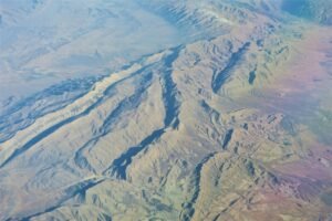 aerial view of snow covered mountains during daytime